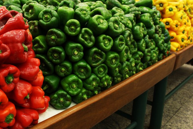 Colorful bell peppers displayed at a market
